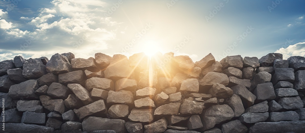 Poster Sunlight shining through a close-up view of a sturdy stone wall, creating a warm and textured pattern. with copy space image. Place for adding text or design
