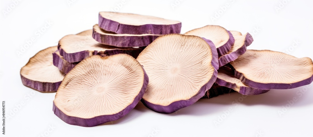 Poster close-up view of a bunch of purple potato slices, showcasing their vibrant color and texture. with c