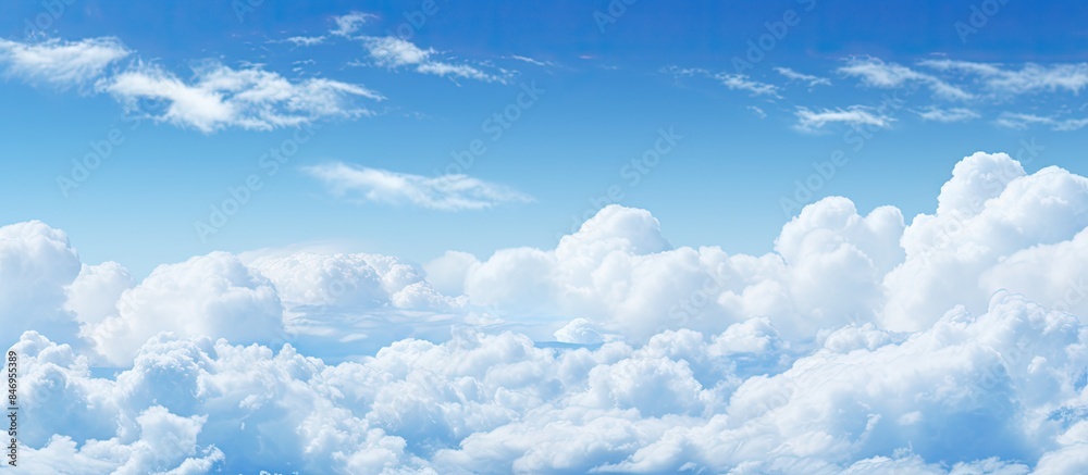 Aufkleber A plane soaring amidst fluffy clouds in a serene blue sky. with copy space image. Place for adding text or design