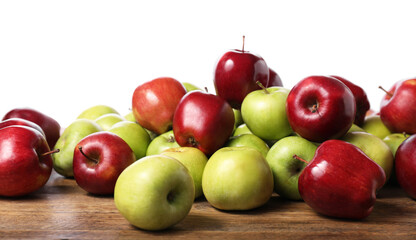 Fresh green and red apples on wooden table against white background