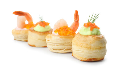 Different delicious puff pastry snacks isolated on white