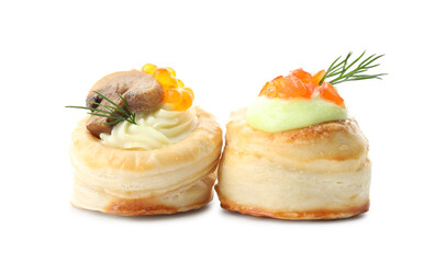 Different delicious puff pastry snacks isolated on white