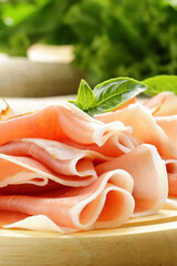 organic prosciutto jamon on wooden board