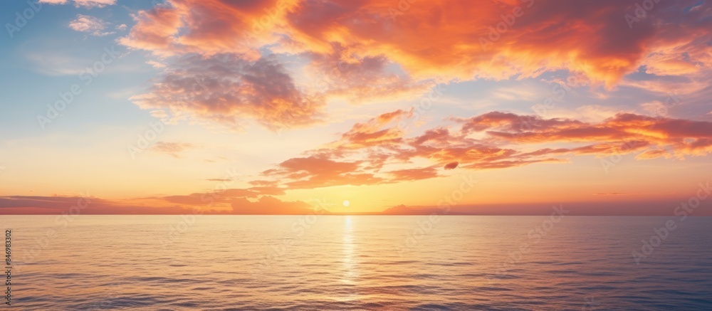 Poster Boat sailing in the golden sunset over the ocean, creating a serene and picturesque scene. with copy space image. Place for adding text or design