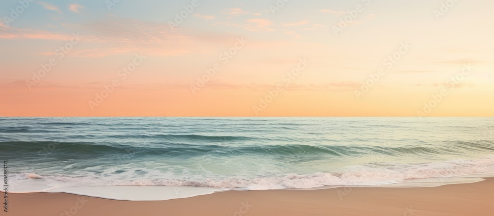 Poster Scenic view of a beach at sunset with waves crashing under a pink sky. with copy space image. Place for adding text or design