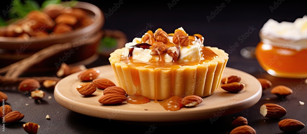 Fototapete Decadent cupcake garnished with a generous amount of nuts and fluffy whipped cream on a delicate plate. with copy space image. Place for adding text or design