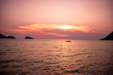 the beach. the sea.sunset. sand.Thailand. Koh chang Island .shot with a retro lens. selective focus. low depth of focus