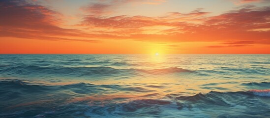 The sun sets over the sea, painting the sky and water in a mesmerizing array of colors and shades, creating a stunning seascape. with copy space image. Place for adding text or design