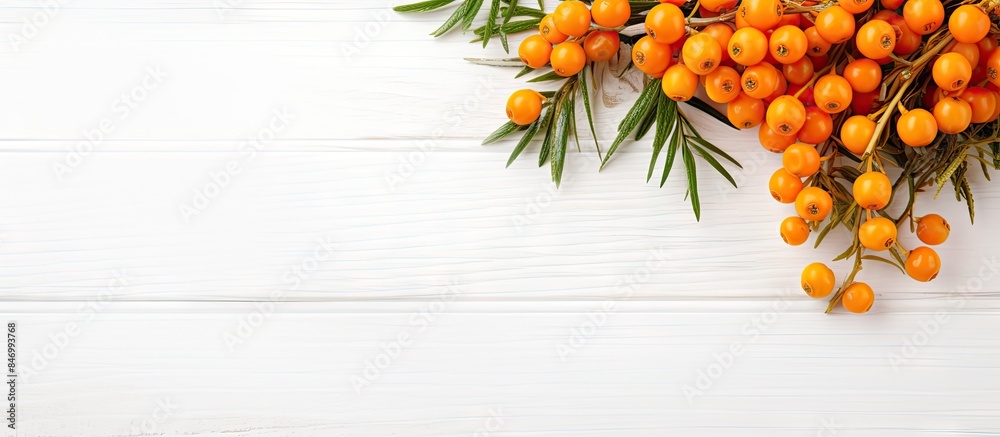 Aufkleber A close-up view of a cluster of vibrant orange berries placed on a white wooden table surface. with copy space image. Place for adding text or design