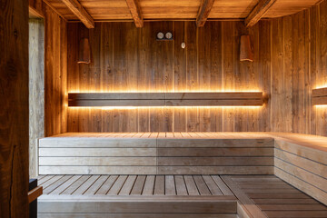 Interior of a wooden sauna with a beautiful view