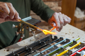 Murano Glassblowing Artisan in Venice, Traditional Handmade Craftsmanship, Glass Working Techniques, Creative Process in Murano Italian Island Workshop, Flame and Heat Manufacturing Skillful Craftsman