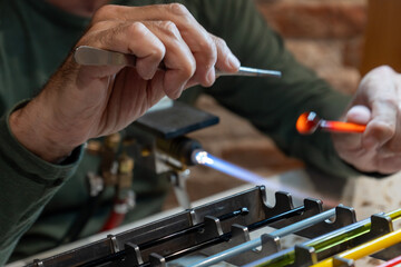 Murano Glassblowing Artisan in Venice, Traditional Handmade Craftsmanship, Glass Working Techniques, Creative Process in Murano Italian Island Workshop, Flame and Heat Manufacturing Skillful Craftsman