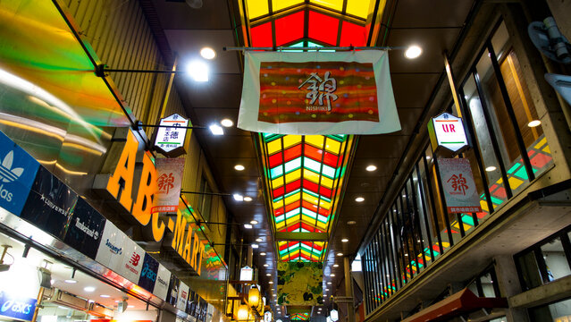 JAPAN, KYOTO &ndash; April 2024: the vibrant colors of the Nishiki Market, with rows of traditional stalls selling fresh produce and local delicacies, souvenirs, Japanese minimalistic style