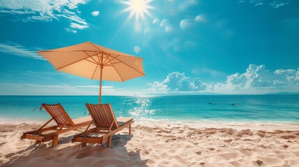 Two lounge chairs sit under a beach umbrella on a beautiful white sand beach