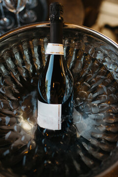 Bottle of sparkling wine in ice bucket