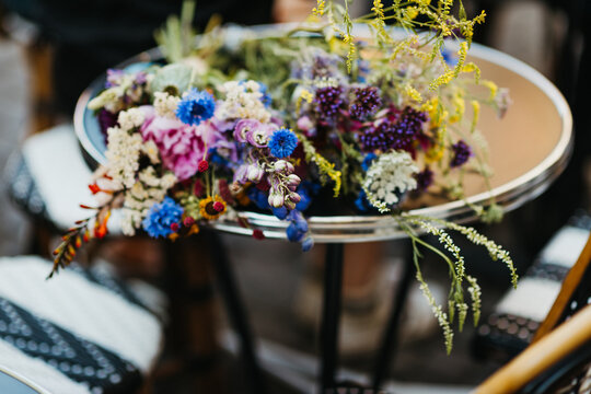 wild flowers on a bistro table in Paris