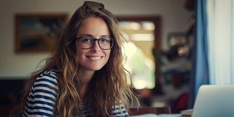 A person working on their laptop, possible remote work or learning scenario