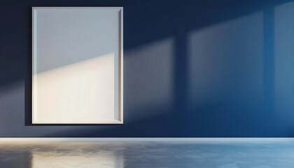 Minimalist gallery with one large white frame on a navy blue wall, highlighted by ambient lighting.