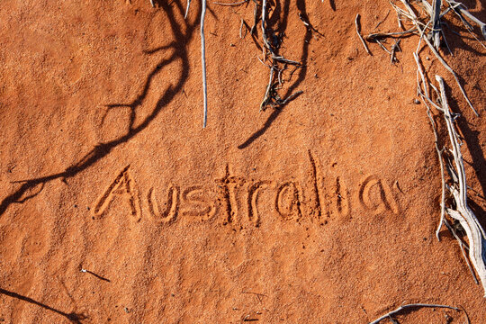 Australia written in the red sand of outback Australia.
