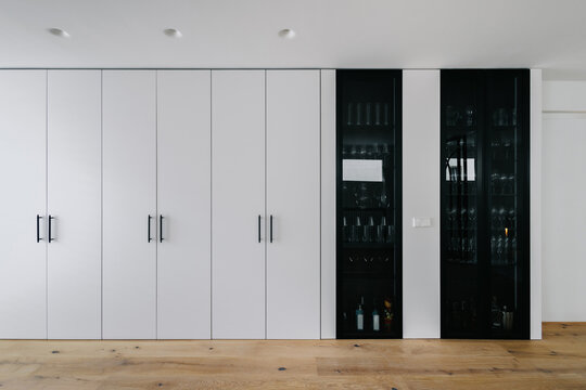 modern room interior with plenty of cabinets for storing 