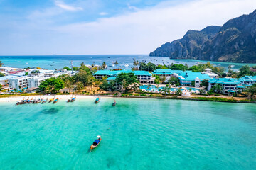 Aerial view landscape longtail boat on Phi Phi island from drone, travel landmark of Thailand