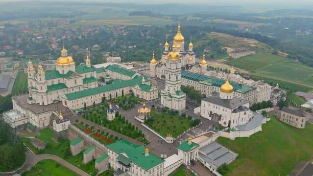 Aerial view of pochaev monastery. Holy dormition pochayiv lavra, Ukraine. Aerial view of pochaev monastery, orthodox church, pochayiv lavra in the morning. Opinion from hills