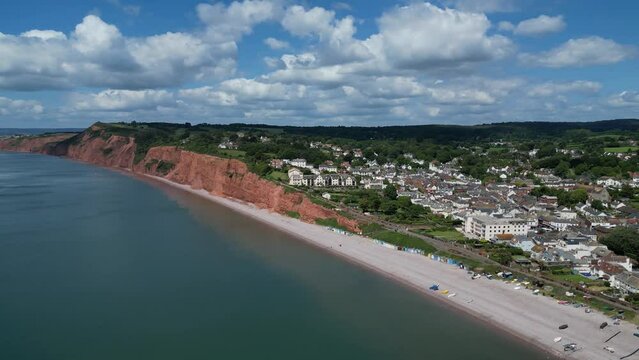 Budleigh Salterton, East Devon, England: DRONE VIEWS: The red sandstone cliffs which form part of the World Heritage Site Jurassic Coast. The Jurassic Coast is a popular UK holiday destination (1).