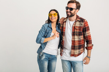 Naklejka premium stylish man and woman in casual denim hipster outfit having fun