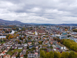 Fototapeta premium Aarau, Argovie, Switzerland Aerial view onto the historical medieval old town with surroundings in autumn colors