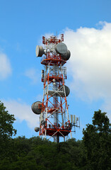 cell phone and television signal repeater with parabolic antennas is a source of very high electromagnetic pollution