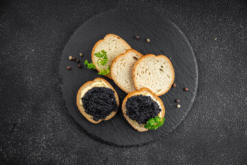 caviar lumpfish sandwich seafood black caviar fresh appetizer meal food snack on the table copy space food background rustic top view