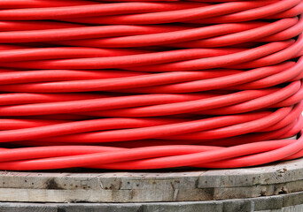 three-phase isolated high voltage red electric cable in the warehouse of the electricity company