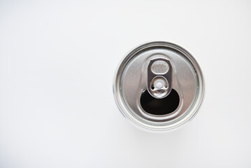 A silver tin can on a white background. A juice can. Aluminum containers.