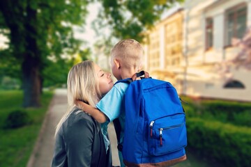 Child Schoolboy with backpack go to school