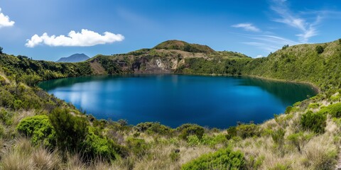 The stunning crater lake of a volcano offers a breathtaking view amidst lush nature.