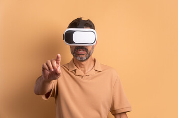 interested brazilian man Using VR headset and gesturing in beige colors. virtual reality, technology simulation concept.