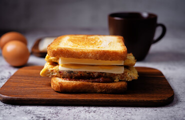 Asian street sandwich with omelette on a wood cut board