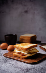 Asian street sandwich with omelette on a wood cut board