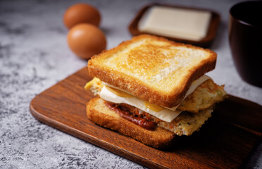 Asian street sandwich with omelette on a wood cut board