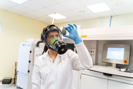 Scientist Holding Sample Printed Using 3D Printer