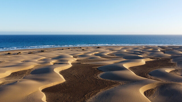 Maspalomas dunes at sunset from a drone view