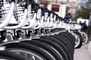 City bikes rental. Wheel closeup.
