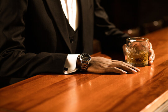 Man's body part in bar 