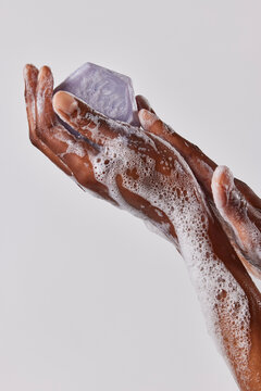 Hand holding soap 