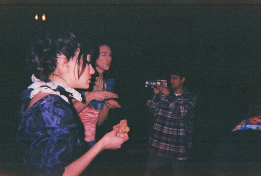Film Photography. Group of friends celebrating