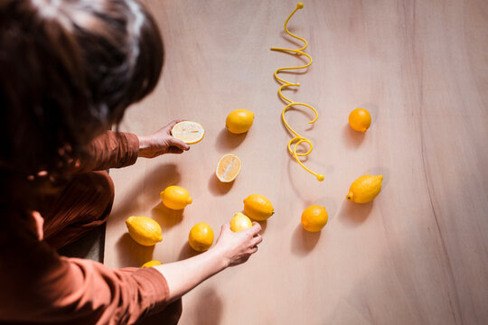 Anonymous artist preparing still life photo shoot