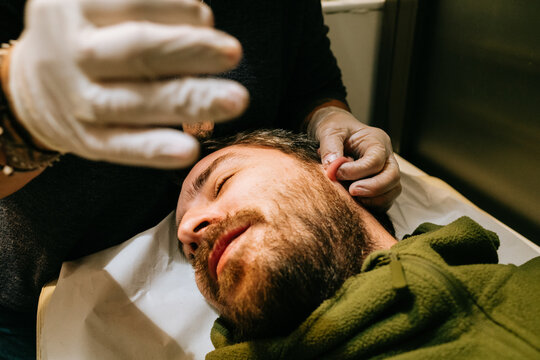 Ear Piercing Session in Progress