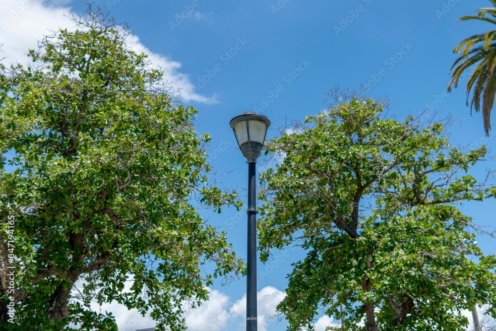 Sticker Street lamps during the day on a sunny day with blue sky