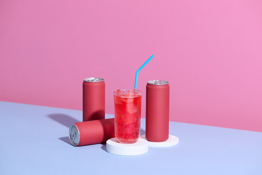 red classic aluminum can for carbonated drinks on pink