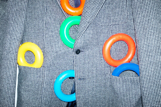 Formal blazer with geometric colorful shapes with direct flashlight